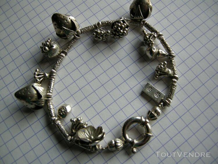 Bracelet en argent massif breloques modele unique