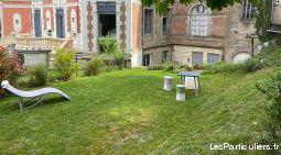 Rez de jardin avec beau terrain et terrasse