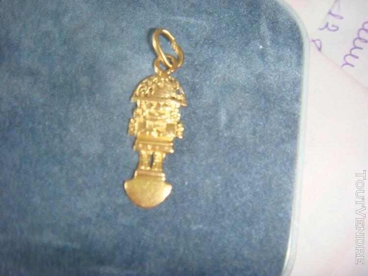 Pendentif tumi or 18 carat neuf