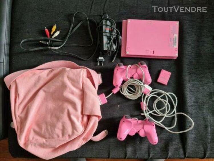 Sony playstation 2 rose + 2 manettes + sac sony et carte mem