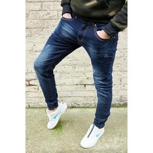 Jeans slim homme en denim bleu à surpiqûres contrastées