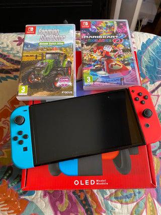 Nintendo switch oled + 2 juegos