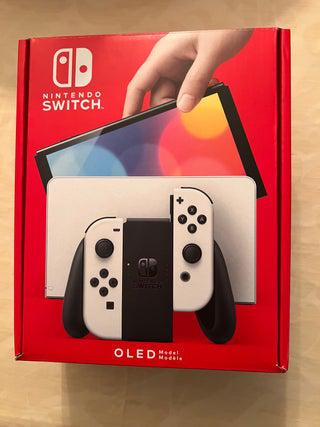 Nintendo switch + 14 juegos.